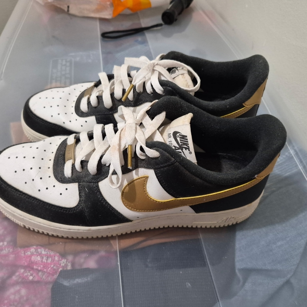 Nike Air Force 1 White, Black, and Gold Sneakers